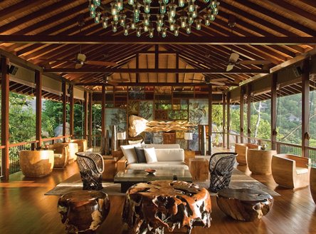 Relaxing lounges in traditional Creole style at Four Seasons Seychelles
