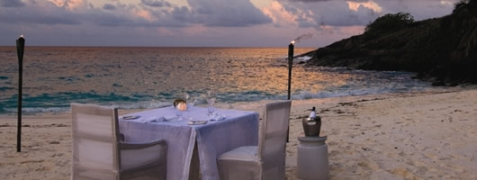 Romantic beach dining on your luxury Honeymoon in Seychelles
