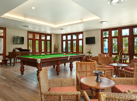 Games room and library at Kempinski Seychelles