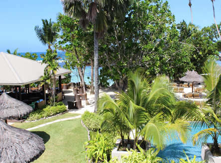 Kempinski Seychelles Resort Windsong bar and swimming pool area